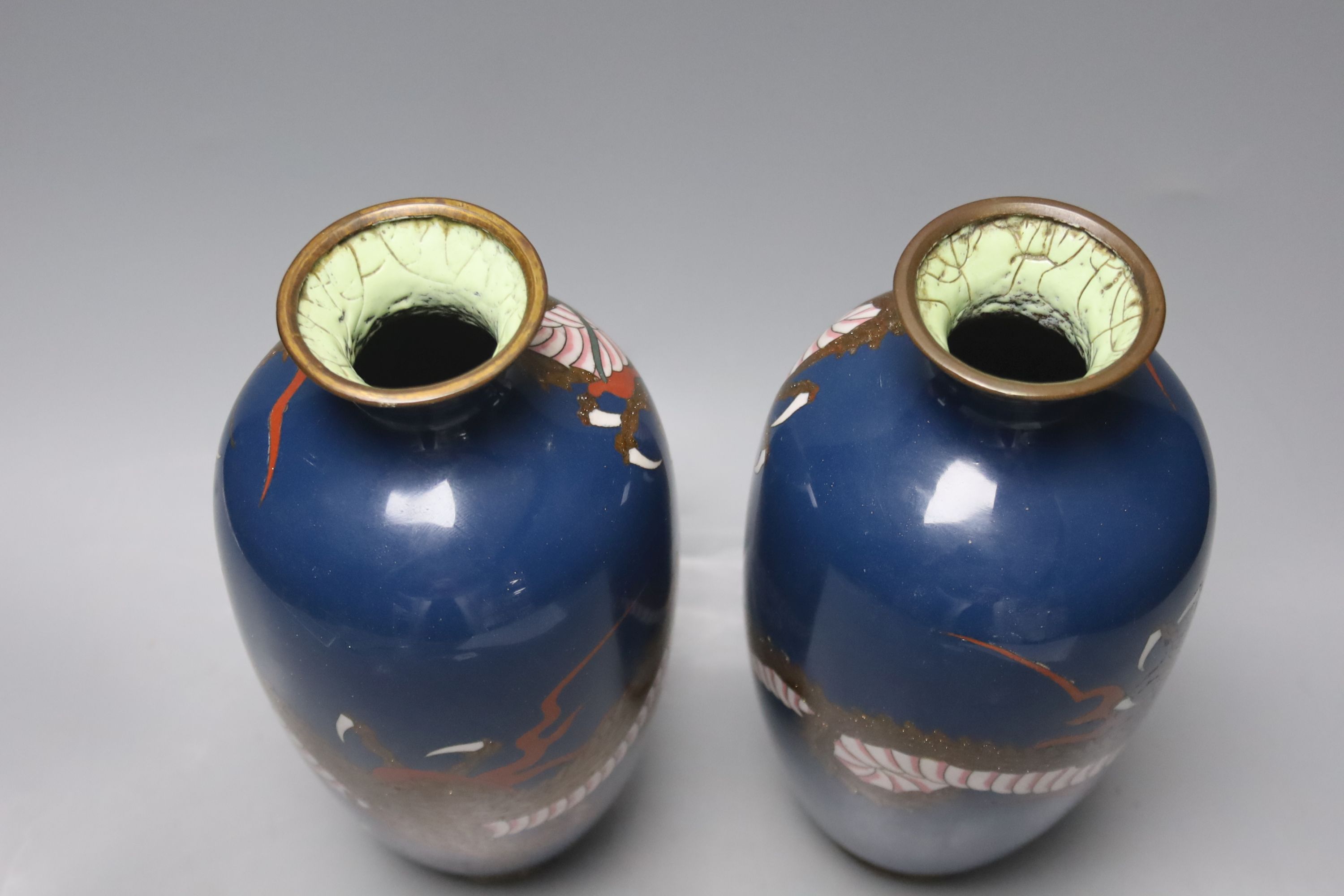A pair of Japanese cloisonne enamel 'dragon' vases, c. 1900